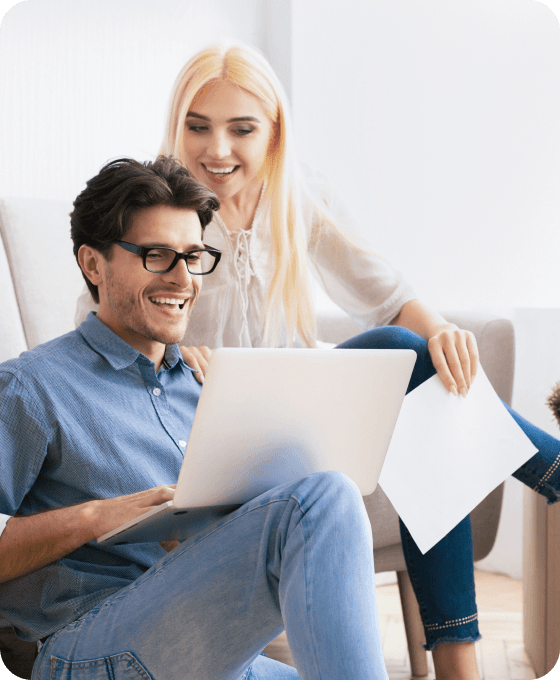 Couple looking at laptop